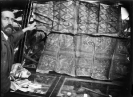 One of the PRM servants holding open a desk case [1998.267.26.5]