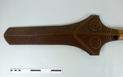 1884.12.115 Carved broad blade head
